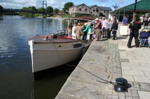 Boarding the boat for the Exeter Canal - a Sidmouth Lions social outing